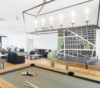 Resident Lounge with Pool Tables, Ping Pong Tables and Seating Areas with TV's